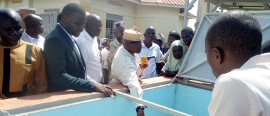 Mayuge RDC, Lt. Hajji Walugembe Aramandhani, officially commissions the solar-powered water supply system in Mitimito village (November 2025).